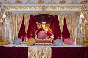 In darkened Kabul under Taliban rule, lavish wedding halls shine as rare beacons of light and joy
