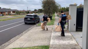 Four arrested after $55k in trading cards stolen in Melbourne