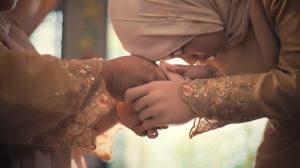 Girl born with congenital limb exchanges first two-handed ‘salam’ with parents thanks to Maybank’s Raya prosthetic