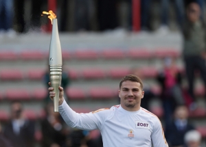 Olympic torches, bizarre costumes and plush Phryge toys fetch more than €200,000 at Paris auction