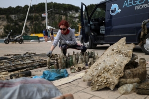 Greece’s eco divers battle litter in Europe’s largest marine park