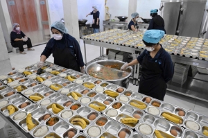 Indonesia’s free school meal scheme under fire after food poisoning, protests and delays